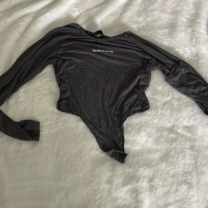 Alphalete knot from long sleeve crop top